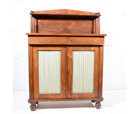 Small Victorian rosewood chiffonier, shelf back, fitted with a single frieze drawer over two doors with pleated panels, bun f