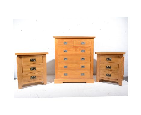 Pair of modern oak bedside pedestals, each with three drawers, width 56cm, depth 42cm, height 64cm; and a similar modern pine