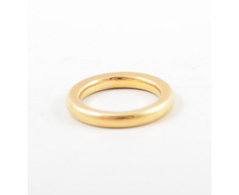 A 22 carat yellow gold wedding band, 3mm wide D shape, approximate weight 7.7gms, ring size J1/2