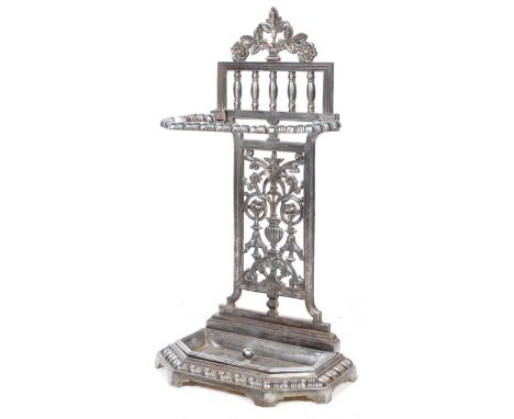 A 19th Century Victorian cast iron stick stand stick / umbrella stand in the manner of Coalbrookdale of comprising of scroll 