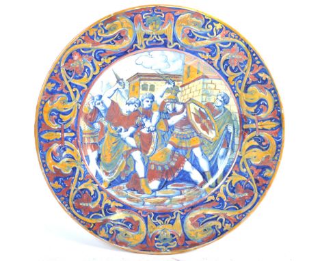 A 19th Century Italian antique Maiolica hand painted lustre finished ceramic charger plate. The charge having a hand painted 