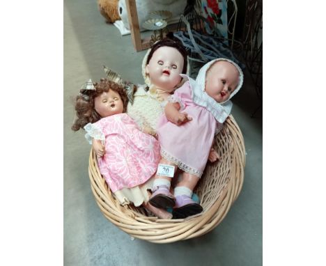 Three vintage dolls.