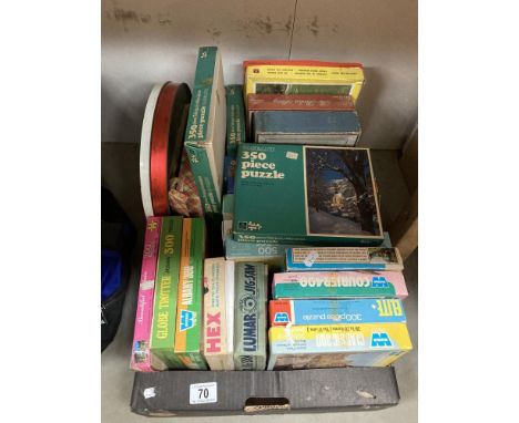 A quantity of vintage jigsaws etc