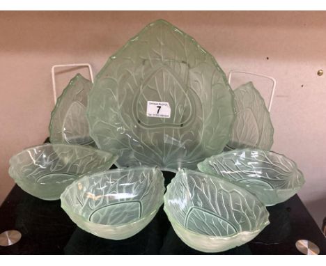 A lovely set of green vintage glass dessert bowls