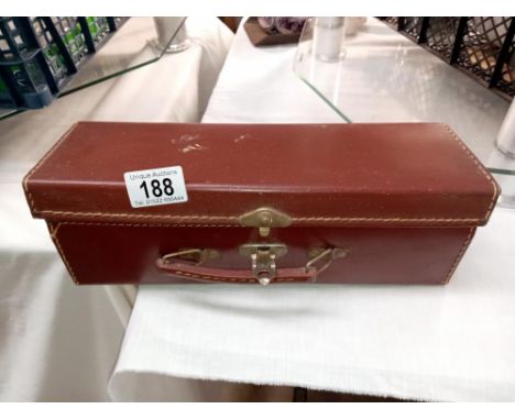 A small vintage case (May be a glove box)