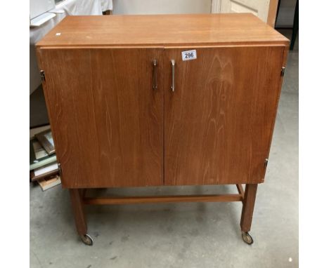 A vintage teak hifi cabinet on castors COLLECT ONLY.