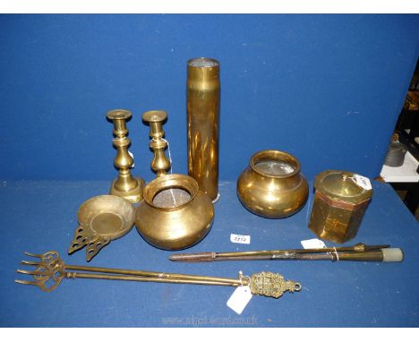 A quantity of brass to include a pair of Georgian style candlesticks, two traditional Indian pots, 1917 shell case, two antiq