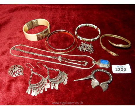 Miscellaneous ethnic style earrings, bracelets, snake bangle and others including some silver.