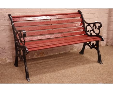 Cast iron and wood slatted garden bench, W128cm   Condition Report   Click here for further images, condition, auction times 