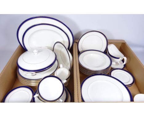 Royal Worcester 'Howard' pattern dinnerware including fifteen dinner plates, two graduating meat plates, tureen, six dessert 