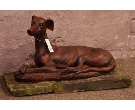 Garden figure of a lurcher on sandstone flagstone, L60cm   Condition Report   Click here for further images, condition, aucti