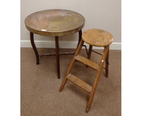 Benares brass top table and a set of folding step ladders, part canteen of cutlery and a Frank Meadow Sutcliffe photographic 