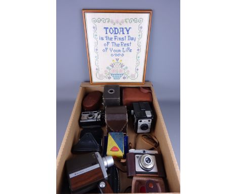 Bell &amp; Howell cine cam, other Vintage cameras and accessories and a needlework framed picture in one box Condition Report