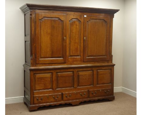 Large 18th century oak cupboard, fielded panelled doors, canted corners with fluted quarter columns, three drawers to base, s