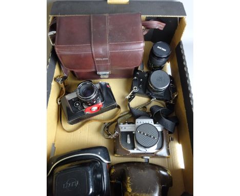 Konica FS, Exakta RTL 1000 and Zenit 11 vintage SLR cameras with lenses     Condition Report   Click here for further images,