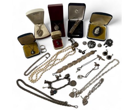 A collection of silver jewellery. To include a double strand of Lotus simulated pearls with a gilded silver clasp; a charm br