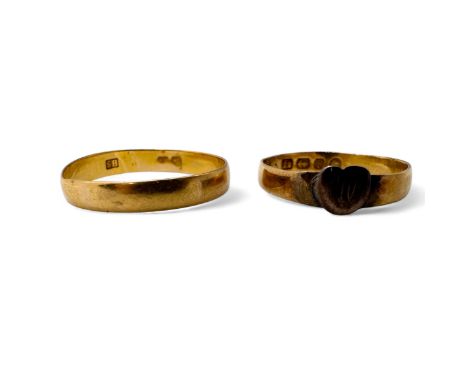 A 22ct gold band ring, with a later added heart initial panel, with a 22ct gold band ring with rubbed marks.  The heart ring 