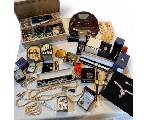 A collection of costume jewellery, watches and dressing table items. To include a ladies DKNY watch; a gentleman’s Sekonda qu