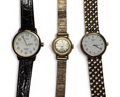 A ladies 18ct gold Candino cocktail watch, on a 9ct gold textured strap.The case features a Swiss Helvetia standard mark and 
