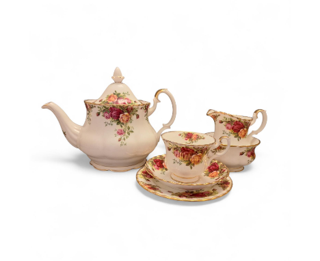 A Royal Albert  Old Country Roses Tea Set ( 62 Pieces ) set has a gilt rim and rococo style handles To Include 8 napkin rings