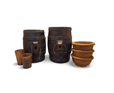 2 small vintage wooden  Liquor barrels impressed marked SK , tallest stands 25cm high, they are in used condition. Along  wit