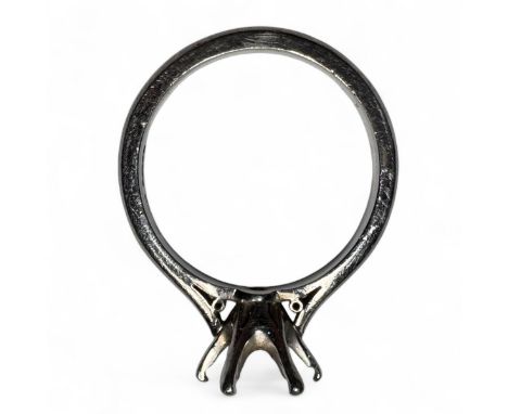 A six claw platinum ring mount, without stone.  Distance between claws approximately 8-9mm at the shortest points. Fully hall