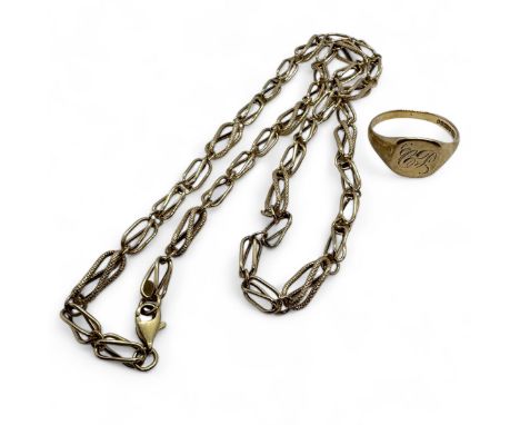 A 9ct gold gentleman's signet ring, together with a 9ct gold fancy link chain necklace. The ring, engraved with the initials 