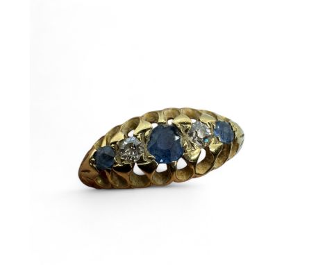 An Edwardian 18ct gold sapphire and diamond half hoop ring.  Set with three round cut sapphires and two old cut diamonds. Hal