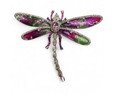 A silver enamel dragonfly combined brooch and pendant set with an estimated 1.48 carats of diamond. Also featuring a 0.50 car