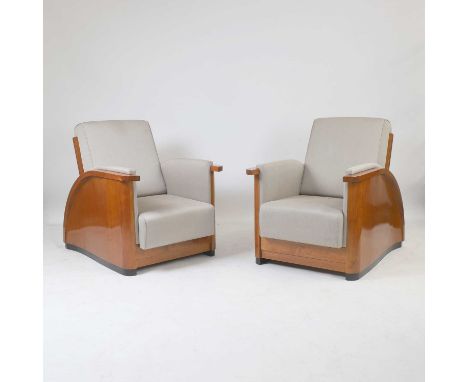 Jean Dunand (Swiss-French, 1877-1942), a pair of reclining armchairs, originally designed c.1928, 1970s, each upholstered in 