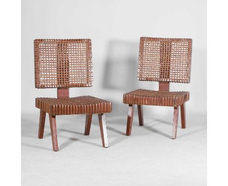 Pierre Jeanneret (Swiss, 1896-1967), a pair of lounge chairs, designed for Chandigarh, c.1956, each of oak and cane, with a s