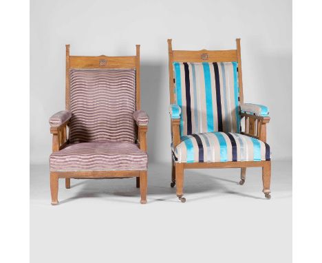 Arts and Crafts, a pair of Arts and Crafts armchairs, early 20th century, each wooden frame with pierced sides and upholstere