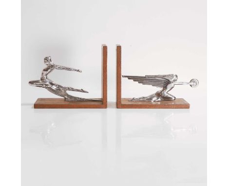 Art Deco, a pair of car mascot bookends, American, each on an oak mount,20 and 21.5cm wide11cm deep16.5cm high (2)Condition R