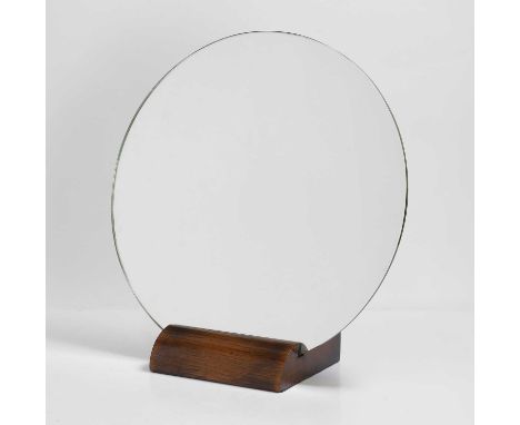 Manner of Émile-Jacques Ruhlmann (French, 1879-1933), an Art Deco circular dressing table mirror, 1920s-30s, raised on a styl