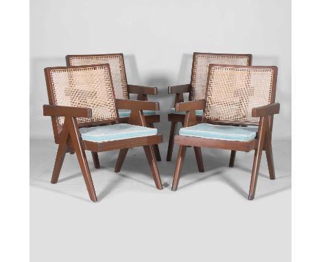 Pierre Jeanneret (Swiss, 1896-1967), a set of four teak and cane 'Easy' armchairs, c.1955, designed for the Public Service Ad
