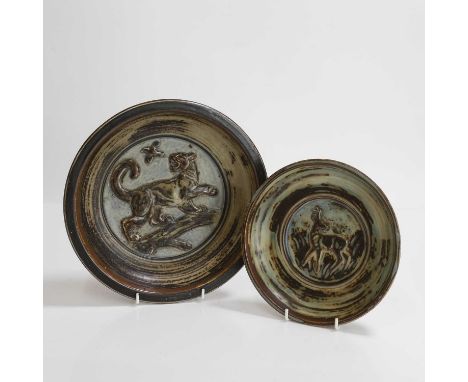 Knud Kyhn (Danish, 1880-1969) for Royal Copenhagen, two plates, mid-20th century, glazed stoneware,the larger example decorat