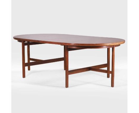 § Robert Heritage (1927-2008) for Archie Shine,  a rosewood circular extending dining table with two leaves, c.1960s, raised 