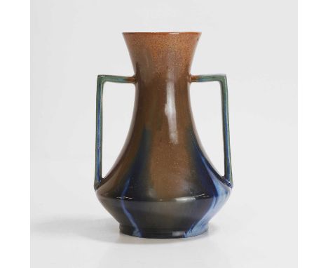 Manner of Dr Christopher Dresser (1834-1904) for Linthorpe Pottery, a twin-handled vase, with a trailing orange and blue glaz