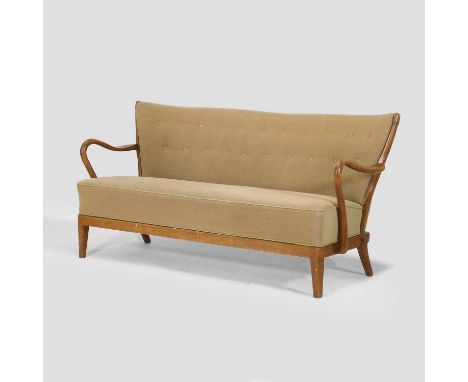 Alfred Christensen (Danish, 1890-1962), a Danish spindle-backed beech settee, possibly for Slagelse Møbelværk, 1940s, with cu