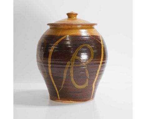 ▲ Clive Bowen (b.1943), an ovoid jar and cover, brown and yellow slip-glazed earthenware,25.5cm diameter33.5cm high (2)Condit
