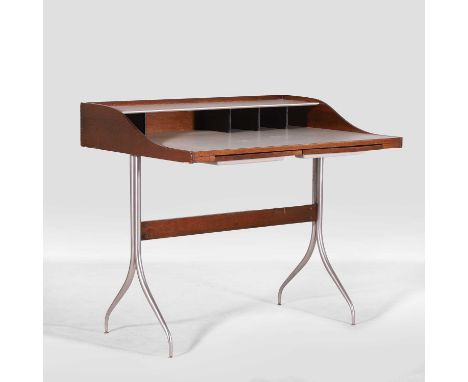 George Nelson (American, 1908-1986) for Herman Miller, a 'Model 5850' desk, designed in 1954, with a walnut frame, a laminate