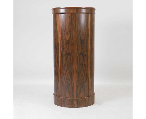 § Johannes Sorth for Bornholms Møbelfabrik, Denmark, a Danish oval rosewood pedestal cabinet, 1960s, model 'no.205', enclosin
