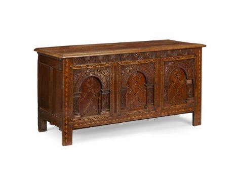 CHARLES I OAK INLAID PANEL CHEST  MID 17TH CENTURY   the hinged top above a foliate carved frieze and triple panel front with