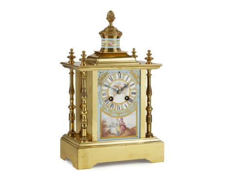 FRENCH PORCELAIN AND GILT METAL MANTEL CLOCK  19TH CENTURY   the rectangular porcelain front panel painted with a Roman numer