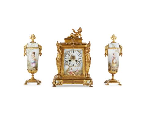 FRENCH PORCELAIN AND GILT BRASS THREE-PIECE CLOCK GARNITURE  LATE 19TH/ EARLY 20TH CENTURY   the clock surmounted by a baccha