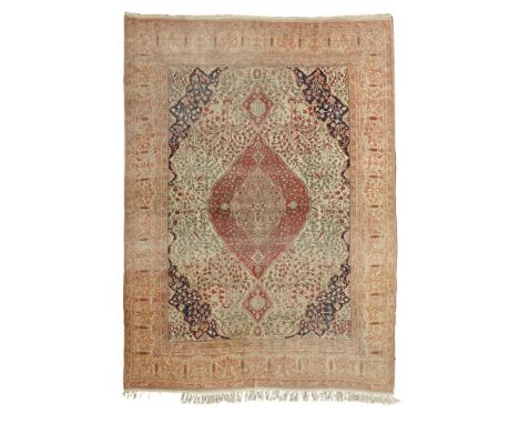 KASHAN 'MOHTASHAM' CARPET  CENTRAL PERSIA, LATE 19TH/EARLY 20TH CENTURY   the cream field with red and light brown medallion,