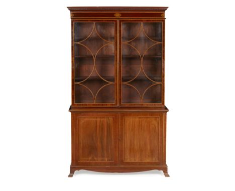 LATE GEORGE III STYLE MAHOGANY BOOKCASE CABINET  LATE 19TH CENTURY   the dentil moulded cornice above a frieze marked with ur