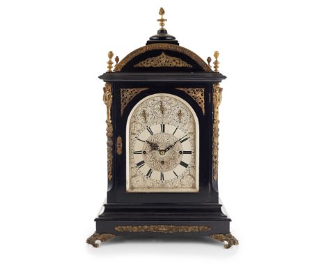 LARGE ENGLISH EBONISED AND BRASS MOUNTED CHIMING BRACKET CLOCK  19TH CENTURY   with flame finials above a domed top and an en