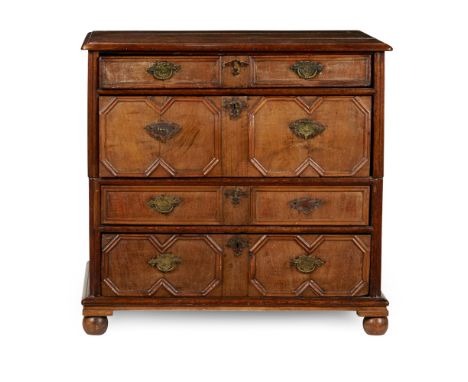 WILLIAM AND MARY OAK AND WALNUT CHEST OF DRAWERS  LATE 17TH CENTURY   in two parts; the rectangular top with a moulded edge a