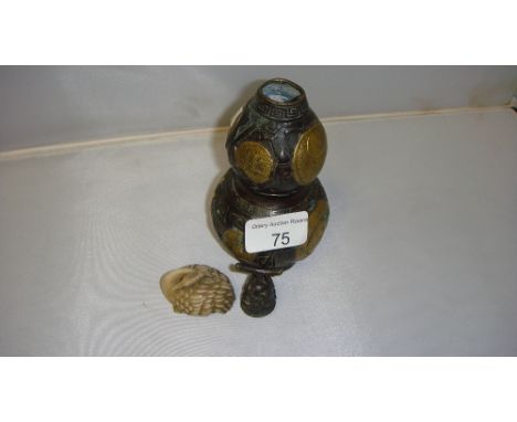 Chinese bronzed metal jar and cover and Japanese style resin netsuke